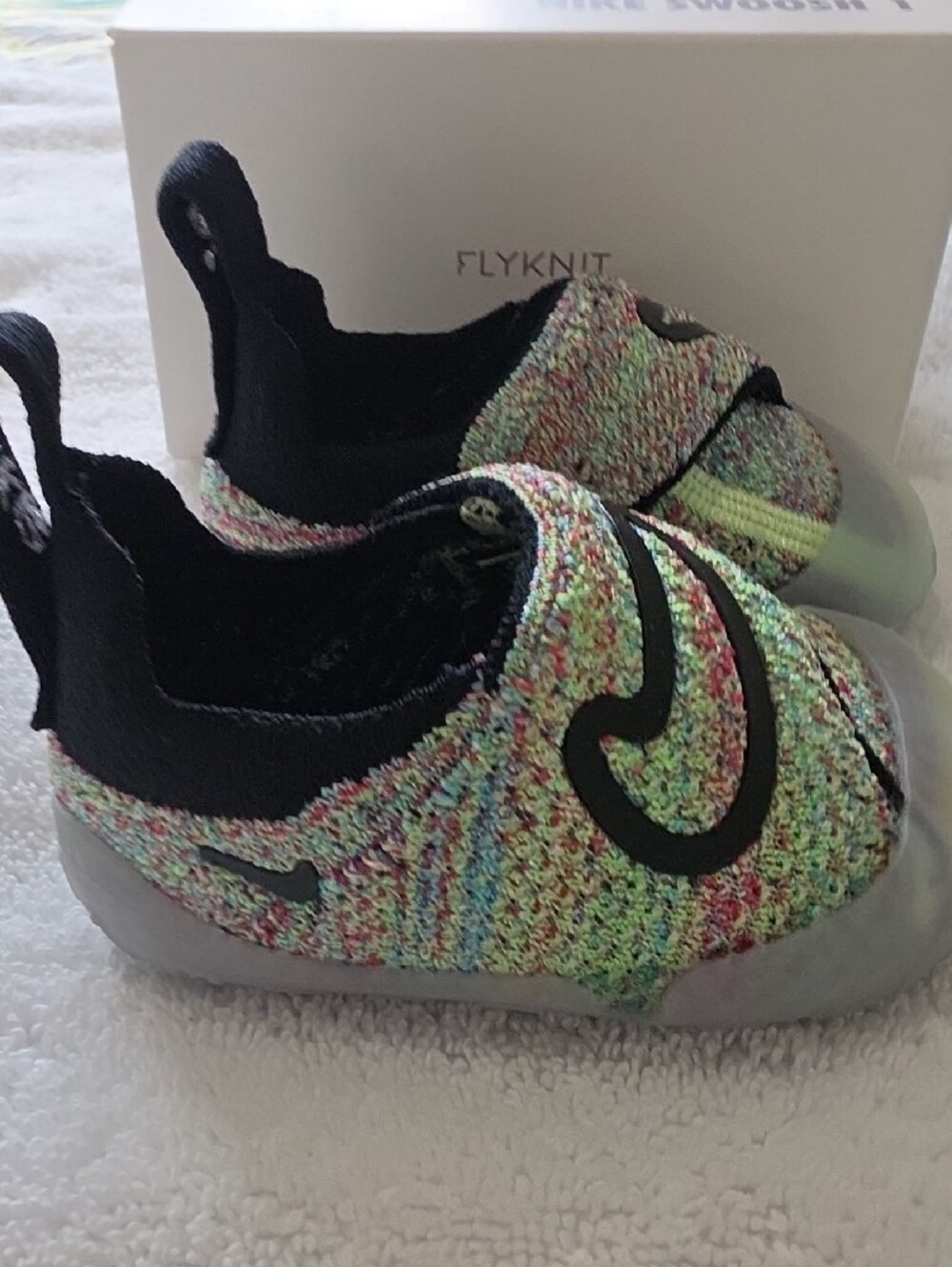 Nike Kids Flyknit Slip-On Sneakers in Black and Multicolor - Picture 4 of 4